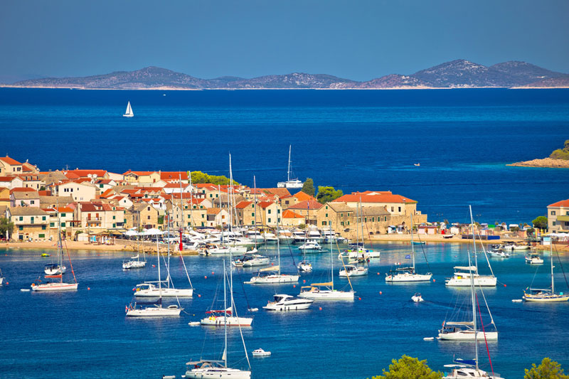 Yachts moored in front of Primosten Island